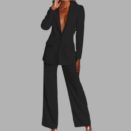 Damkostym med kavaj och vida byxor 