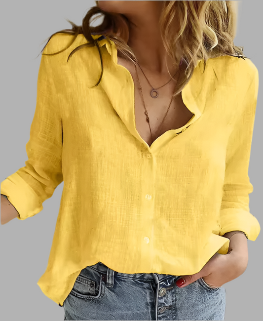 Dames blus med knäppning och lång mouwen